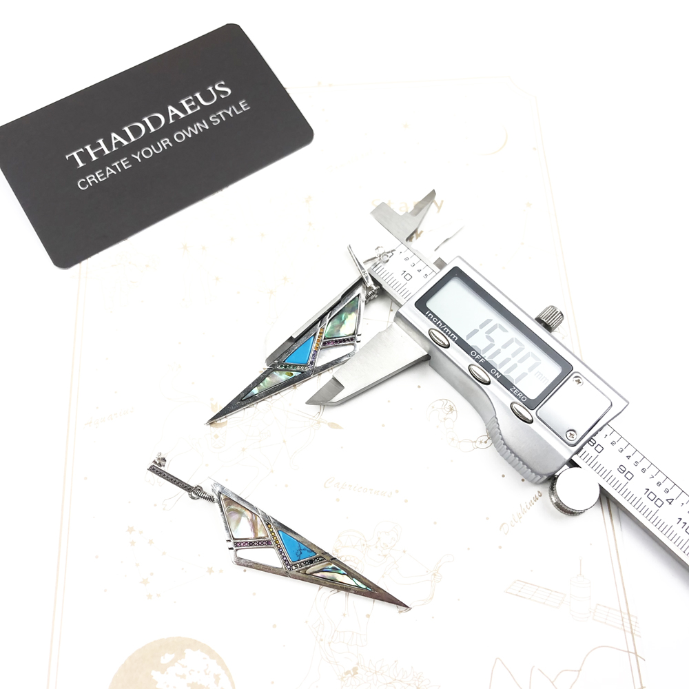 Orecchini triangolo, gioieller - Ethnic Fashion Meaning recensione e prezzo